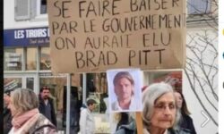 Γαλλία: Viral η συνταξιούχος με το πλακάτ «Αν θέλαμε να μας γ@@@ει  η κυβέρνηση, θα είχαμε ψηφίσει τον Μπραντ Πιτ»